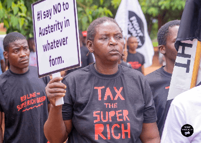 A woman protesting austerity measures
